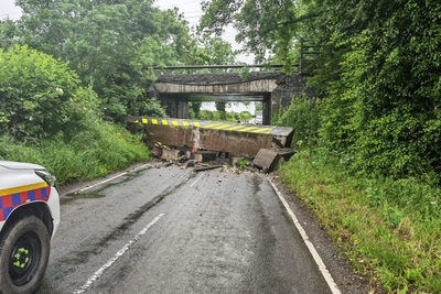 Railway bridge collapses after lorry crash causing major travel disruption
