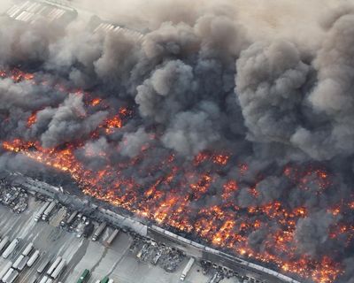 Fire at California warehouse complex prompts evacuations as authorities fight blaze