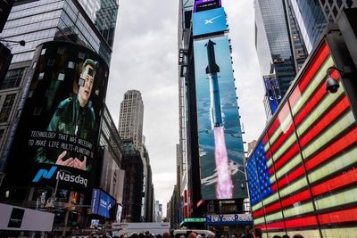 Astronaut costumes, teenage crypto millionaires, and a $300 million bet: Scenes from the SpaceX IPO