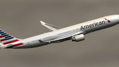 Passenger says American Airlines deplaned a full flight at midnight over the pilot reportedly being too tired to fly