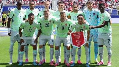 Why are Switzerland playing in green vs Qatar?