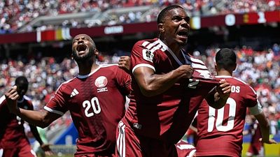 Qatar claims first-ever World Cup point with dramatic stoppage-time equaliser