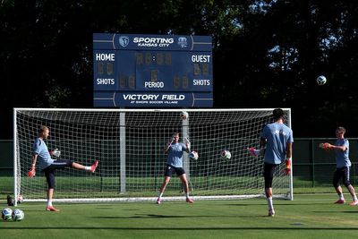Two men charged over theft of England equipment at World Cup