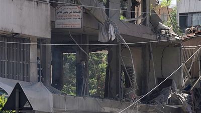 Iran warns of 'imminent' response as Israel strikes Beirut