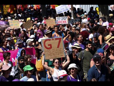 Thousands gather in Geneva to protest G7 as Trump, other leaders hold summit in nearby France