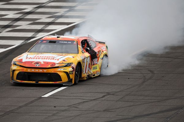 Denny Hamlin wins third consecutive NASCAR Cup race, beating Reddick at Pocono