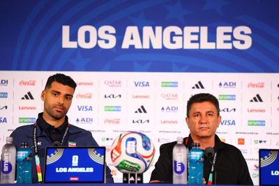 Iran’s footballers arrive in US amid peace deal but admit tension ‘undermines joy’