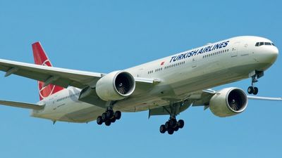 Flight was landing when its wing clipped a structure. The next thing the passengers knew, it tore a hole in the side of the plane