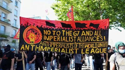 Tear gas, burning Tesla and smashed windows: 20,000 protest G7 summit in Geneva ahead of Trump's arrival