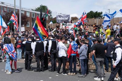 Protesters clash outside London synagogue staging Israeli property show as police make 14 arrests