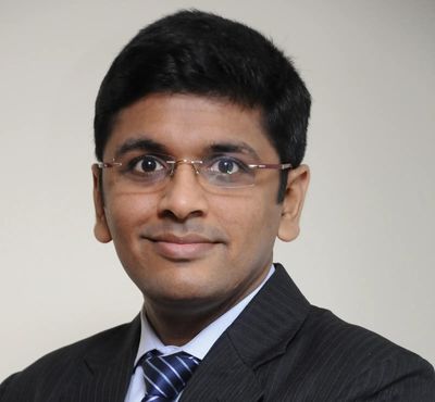Rupee may gain ground as crude prices ease and FCNR inflows rise, says Navneet Damani