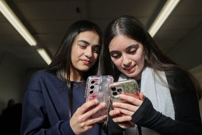 UK children are spending at least two hours a day on social media, Ofcom finds