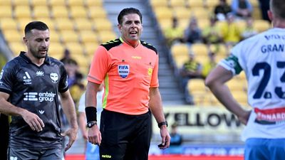Australian referee cleared over hand gesture