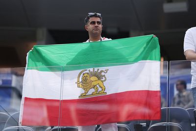 Protests erupt outside Iran’s World Cup opener after court upholds flag ban