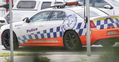 Empty car rolls down embankment, blocks road