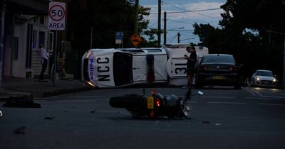 Jail for armed driver who hit motorbike rider and flipped police car