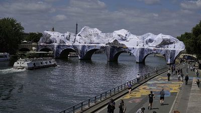 A cave for a crowd: French artist JR opens 'Caverne' art work on Pont Neuf bridge in Paris