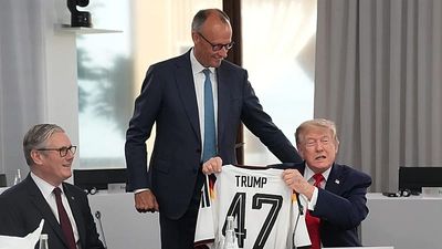 Watch: German chancellor surprises Trump with 'Trump 47' football jersey at G7