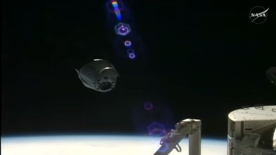 Home again! SpaceX Dragon cargo capsule splashes down off California coast