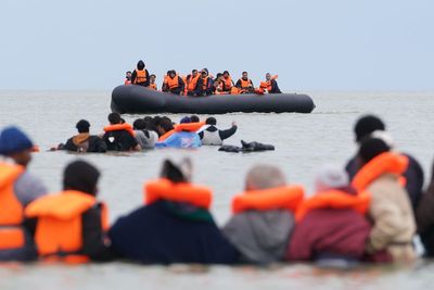 More than 700 migrants cross Channel in largest single-day total this year