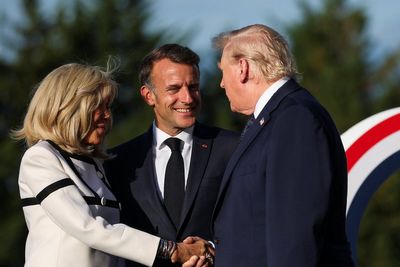 Trump and Brigitte Macron share intense handshake at G7 summit