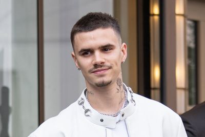 Romeo Beckham fined £440 for using phone while driving supercar