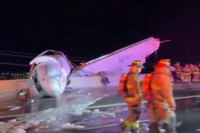 Burning business jet slams into Texas highway as bystanders rush to save passengers