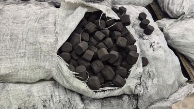 Three charged after meth hidden in charcoal bags bust