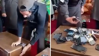 Taliban order ban on smartphones as officials shown destroying devices