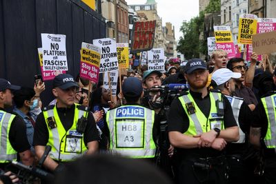 Tommy Robinson speaks to half-empty hall as protesters block Oxford Union debate
