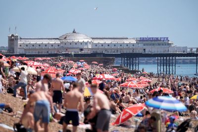 Amber health alerts issued across England as temperatures soar to 33C
