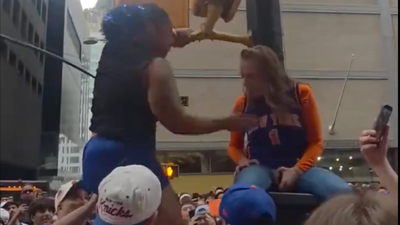 Knicks Fan Ripped From Light Pole Gets Pantsed Before Unbelievably Twerking on Her Opponent During Parade Brawl