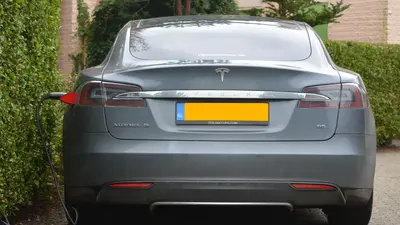 Connecticut man drives his Tesla through a fence and into a public pool – he says he was trying to park it