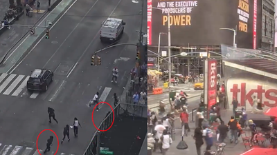 Watch: Crowds scatter as shots ring out in New York's Times Square