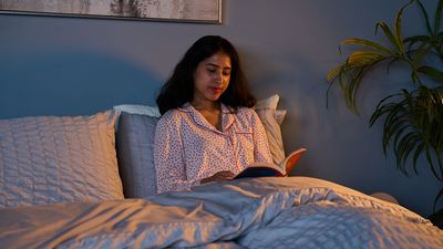 Reading in bed was causing me to wake up at 3 a.m. — until an insomnia expert made this simple routine tweak to help me sleep through
