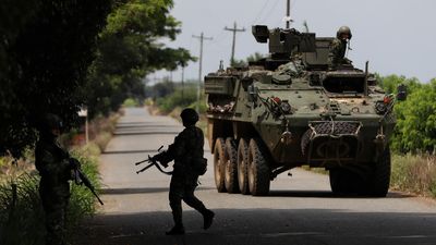 Colombia sees new peace breakthrough as 100 rebels hand over arms