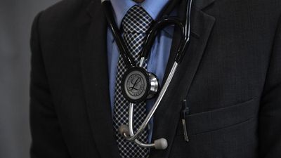 Pediatrician accused of molesting 10 kids faces court