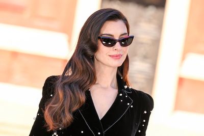 Anne Hathaway expecting third child as she reveals baby bump in surprise video
