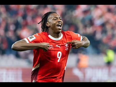 Soccer: Swiss wonderkid Manzambi dazzles in World Cup win