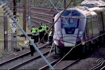 One dead and dozens seriously injured as two trains collide near Bedford