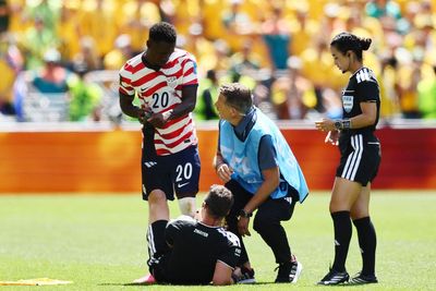 USA v Australia referee Felix Zwayer pulls up with cramp towards end of World Cup match