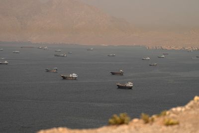Iran closes Strait of Hormuz after accusing US and Israel of breaching ceasefire
