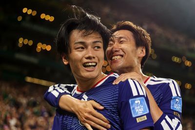 Japan thrash Tunisia in record World Cup win to close on knockouts
