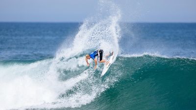 Two surfers left standing after Aussie wipe-out in Rio