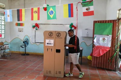 Colombians choose between an outsider and a progressive in a presidential runoff election, in photos