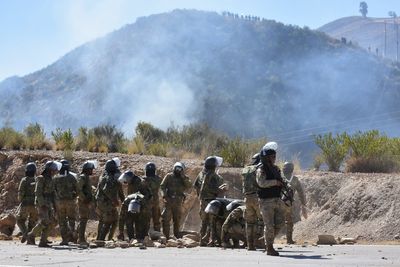 Bolivia clears anti-government roadblocks after emergency decree, as patrol plane crash kills 6