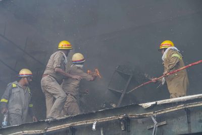 Lucknow coaching fire: Horrifying visuals show people jumping from first floor of coaching centre, bystanders rescue victim