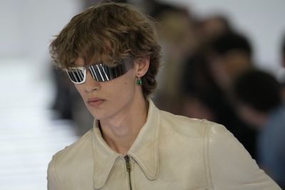 Milan designers go lighter in silhouette, if not materials, for next summer