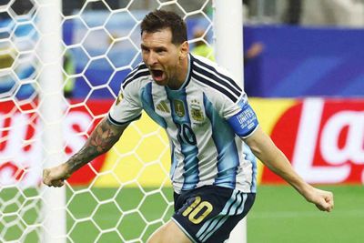 Argentina shut down Austria 2-0 as Lionel Messi makes history