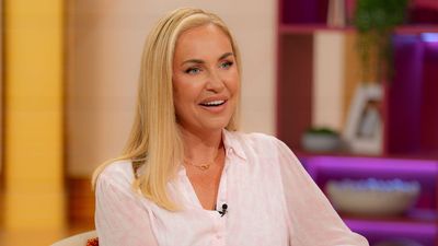 Josie Gibson masters warm-weather elegance in this pastel pink shirt dress that needs no styling